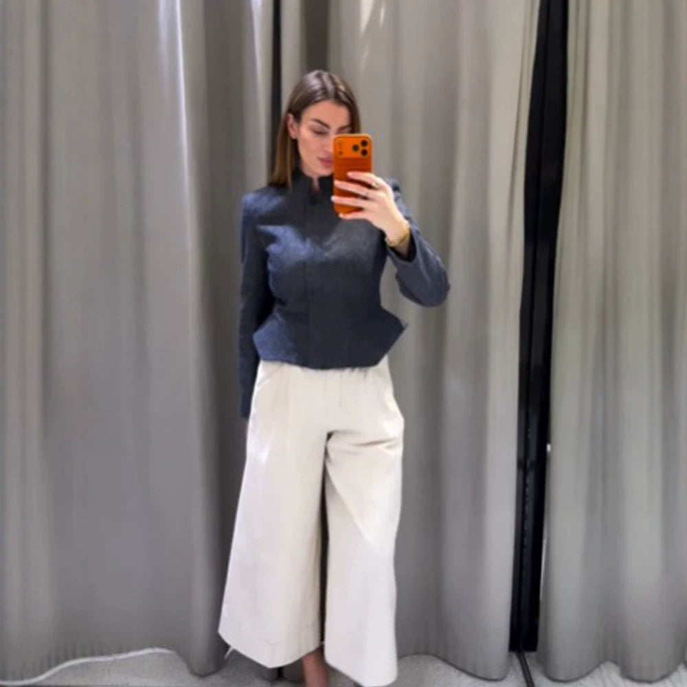 Women's short blazer with stand-up collar, fitted peplum, and concealed button placket Amarae