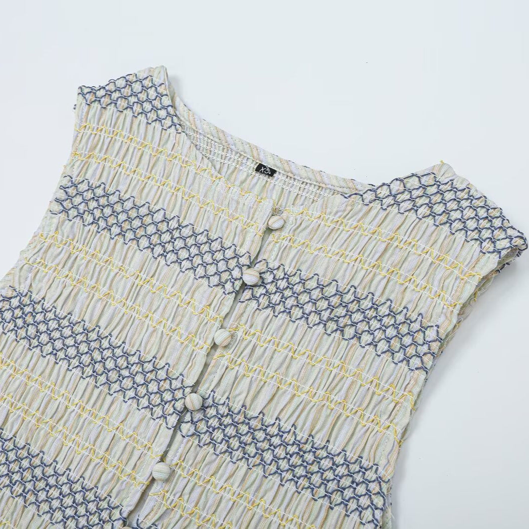 Women's gathered sleeveless top with smocked bodice, button placket, and flared hem Amarae