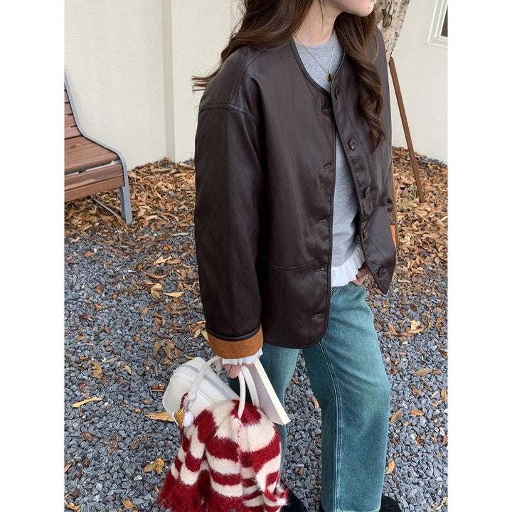 Ladies fashionable leather jacket with checked lining Chic & Stil