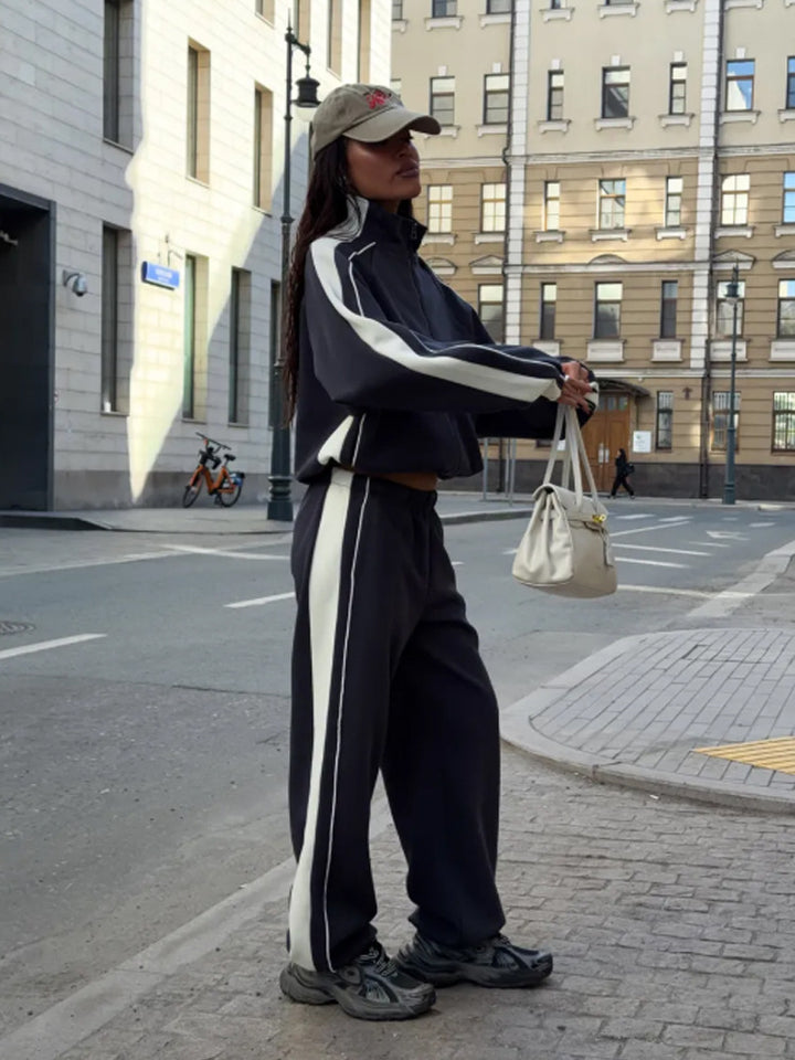 Women's oversized tracksuit with zip jacket, wide joggers, and contrast side stripes Amarae