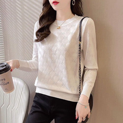 Pull en maille pour femmes avec une texture élégante en motif œillet Chic & Stil