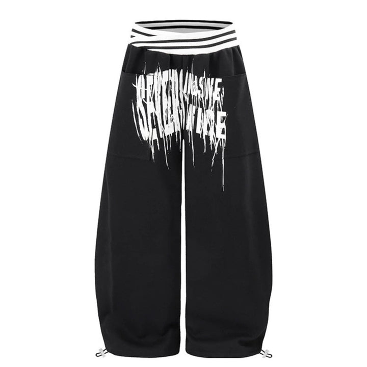 ladies culotte jogging pants with high-contrast waistband, patch pockets, and drawstring hem.