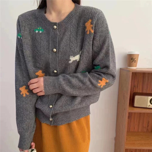 Cardigan en tricot confortable pour femmes avec un design ludique et des boutons pratiques Chic & Stil