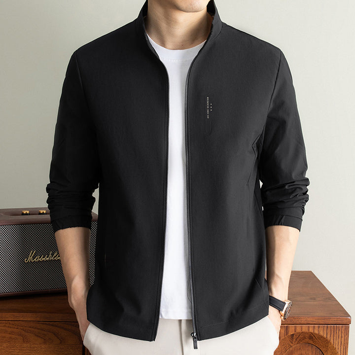 Men's lightweight technical transitional jacket with stand-up collar, wind- and water-repellent surface, and elastic cuffs Amarae