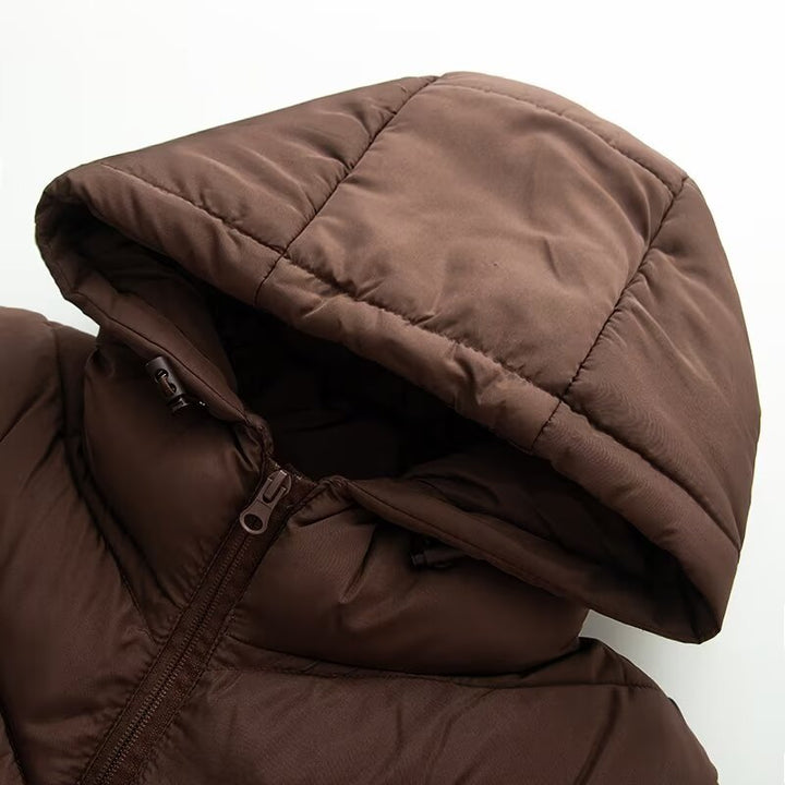 Women's hybrid quilted jacket with padding, hood, and elastic sleeve inserts Amarae