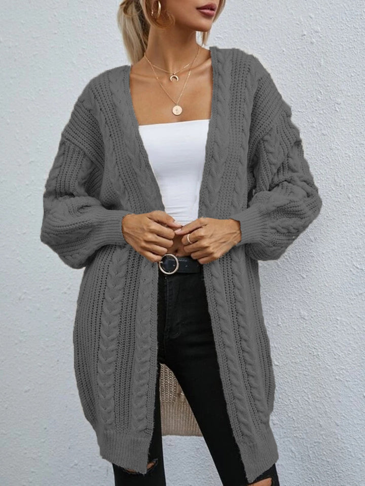 Thick knitted cardigan for women with a relaxed oversized fit and a refined cable pattern Lune London