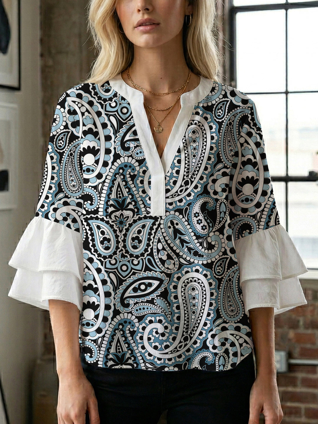 Women's blouse with voluminous wing sleeves and intense leaf pattern Lune London