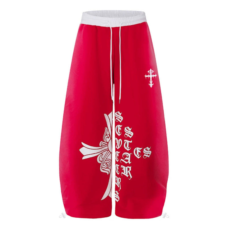Women's extra-wide culotte sweatpants in palazzo style with a high comfort waistband, drawstring, and gothic cross print Amarae