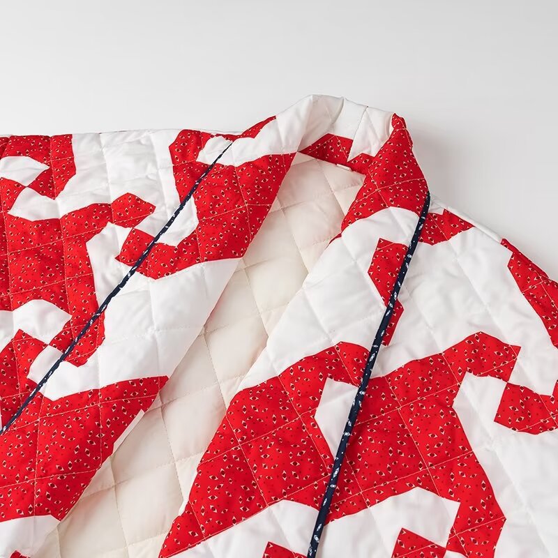 Quilted jacket for women with modern graphic design and open cut Amarae