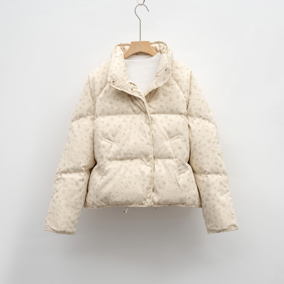 Veste matelassée volumineuse pour femmes avec un design floral et des poches pratiques Lune London