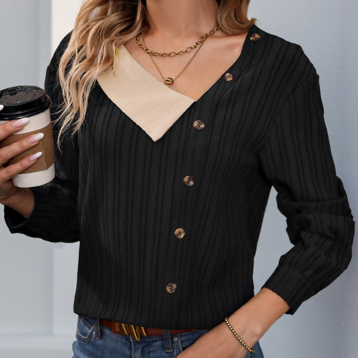Women’s knit top with a unique V-neckline and a button placket Lune London