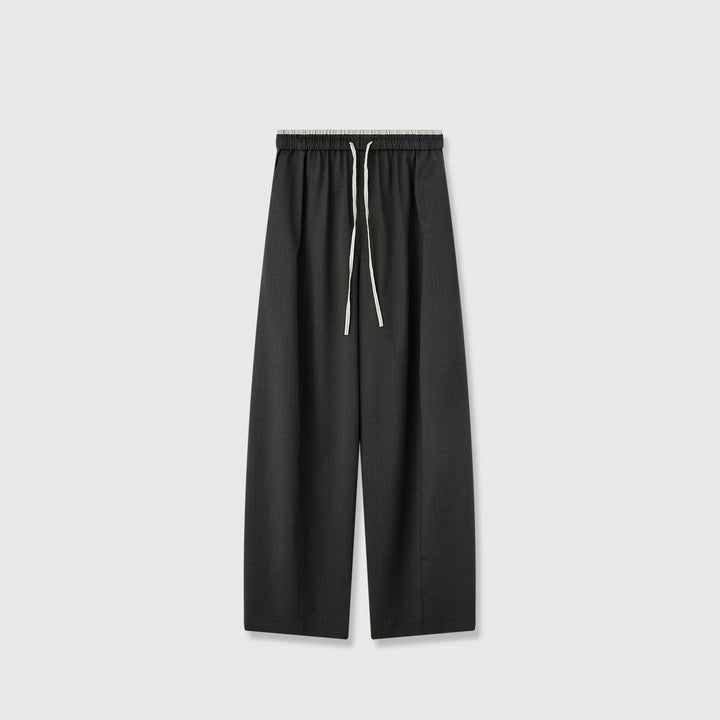 Pantalons en tissu large pour femmes avec taille élastique et poches pratiques Chic & Stil