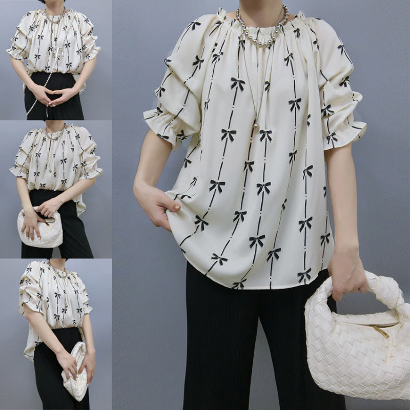 Blouse for women with ruffled sleeves and bow pattern Lune London