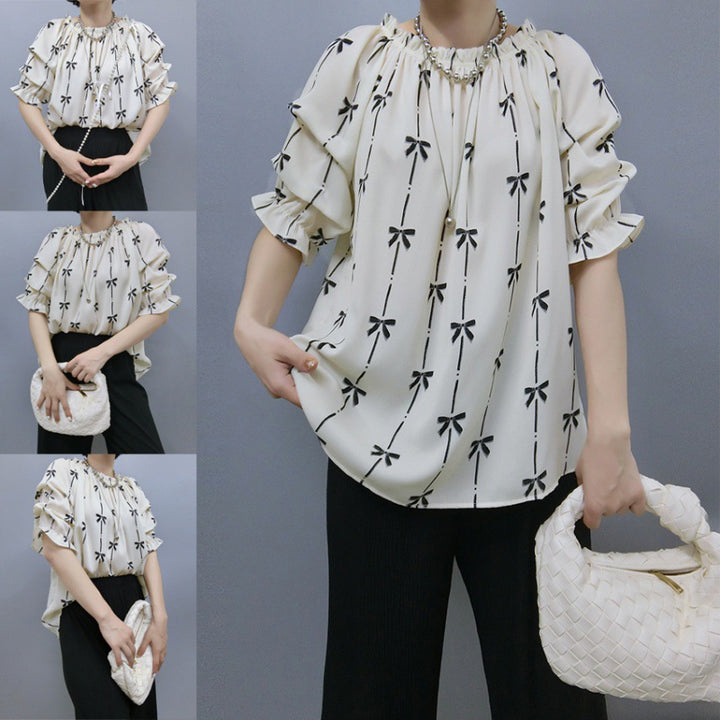 Blouse for women with ruffled sleeves and bow pattern Lune London