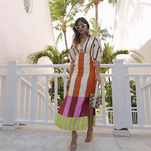 Maxi dress for women with a captivating striped pattern and a feminine waist effect Amarae