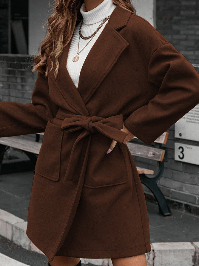 Ladies wrap coat with tie belt, large flap pocket and lapel collar Amarae