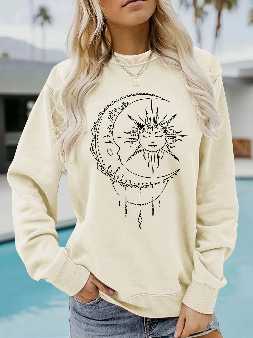 Sweatshirt pour femmes avec un design artistique de soleil et de lune Chic & Stil