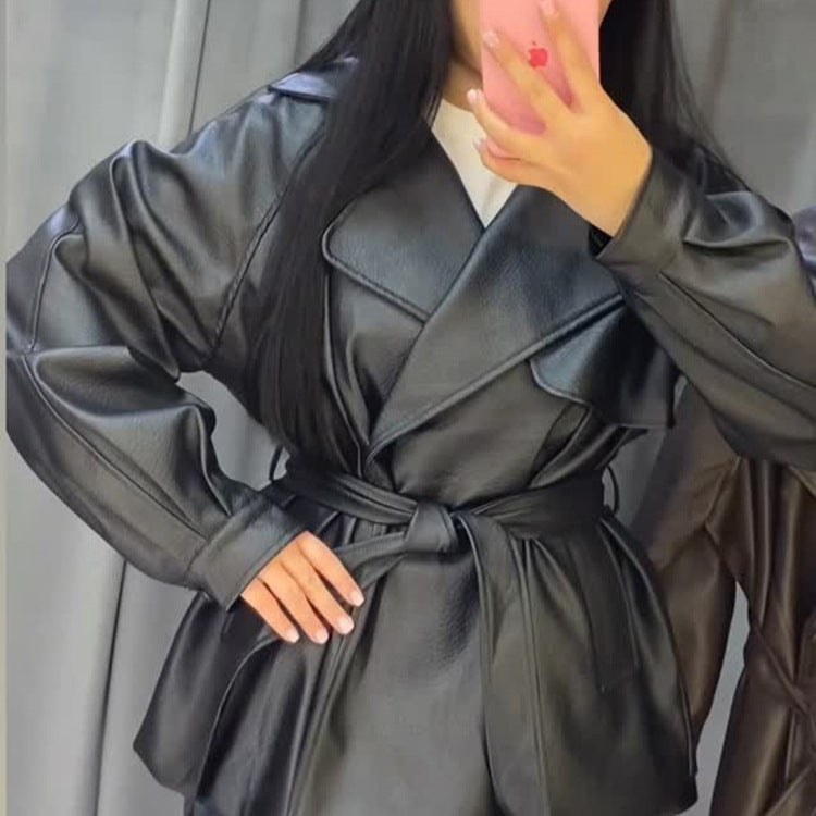 Women's Short Faux Leather Wrap Jacket with Waist Belt and Oversized Lapel Amarae