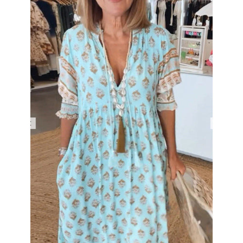 Airy tunic dress for women with floral patterns and delicate ruffle details Amarae