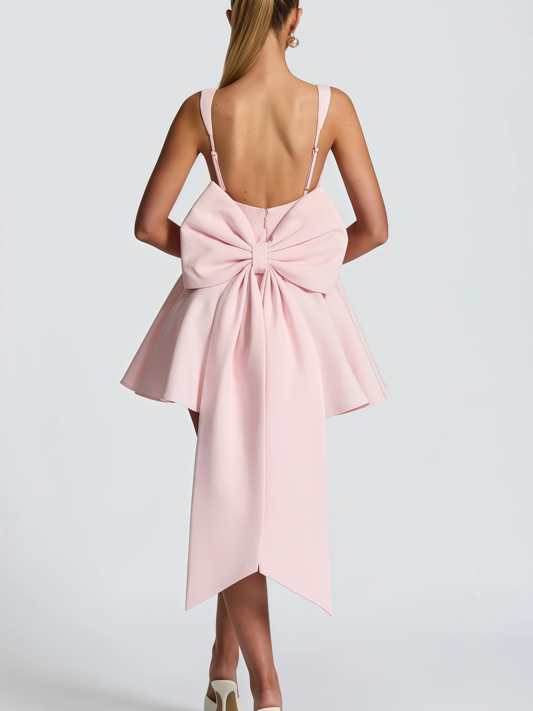 Women's cocktail dress with oversized bow design and flowing skirt Lune London