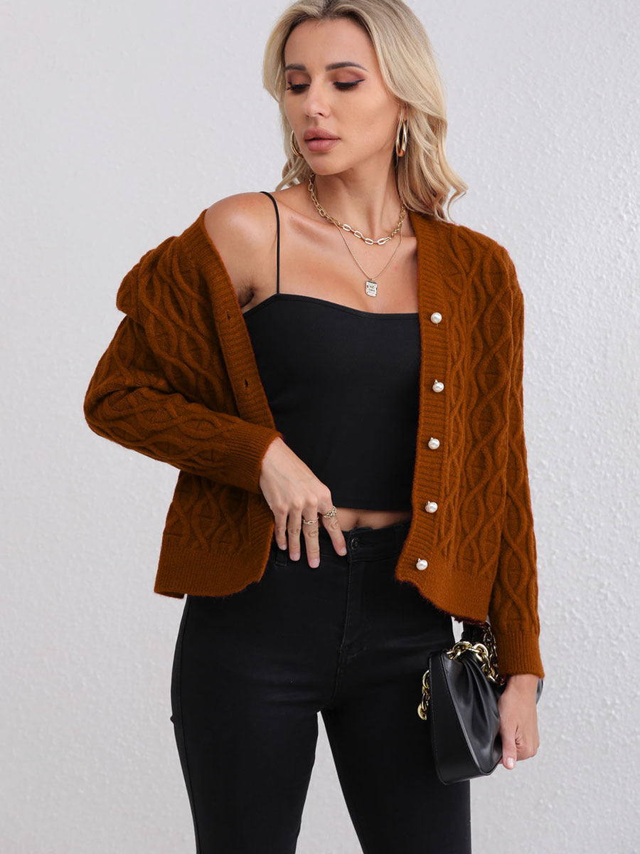 Women's knit jacket with modern cable pattern and pastel button details Lune London