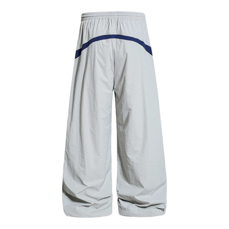 Women Wide Nylon Palazzo Training Pants with Drawstring, Side Contrast Triangles and Adjustable Hem Amarae