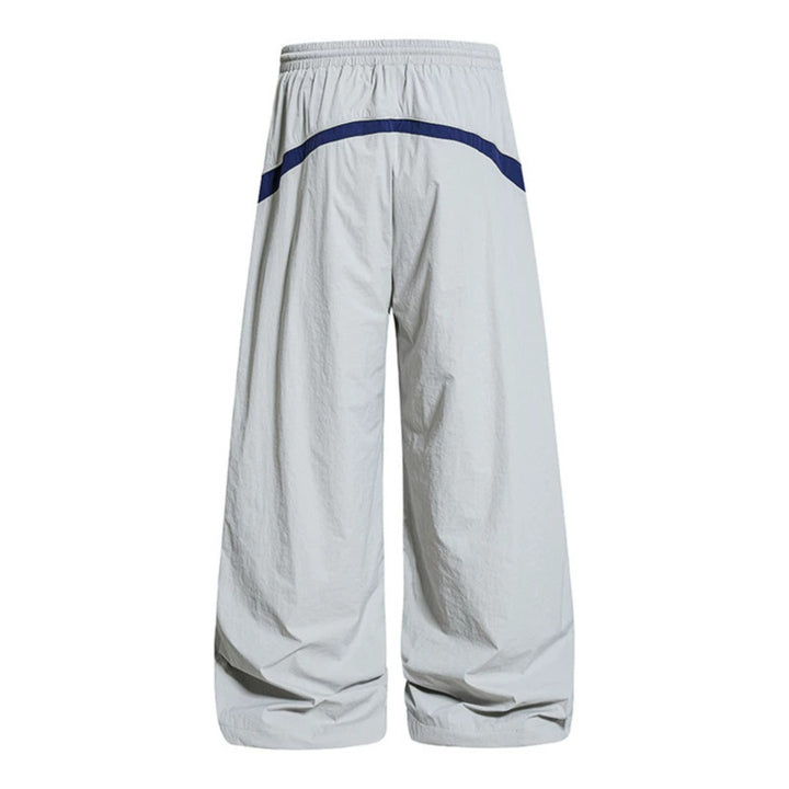 Women Wide Nylon Palazzo Training Pants with Drawstring, Side Contrast Triangles and Adjustable Hem Amarae