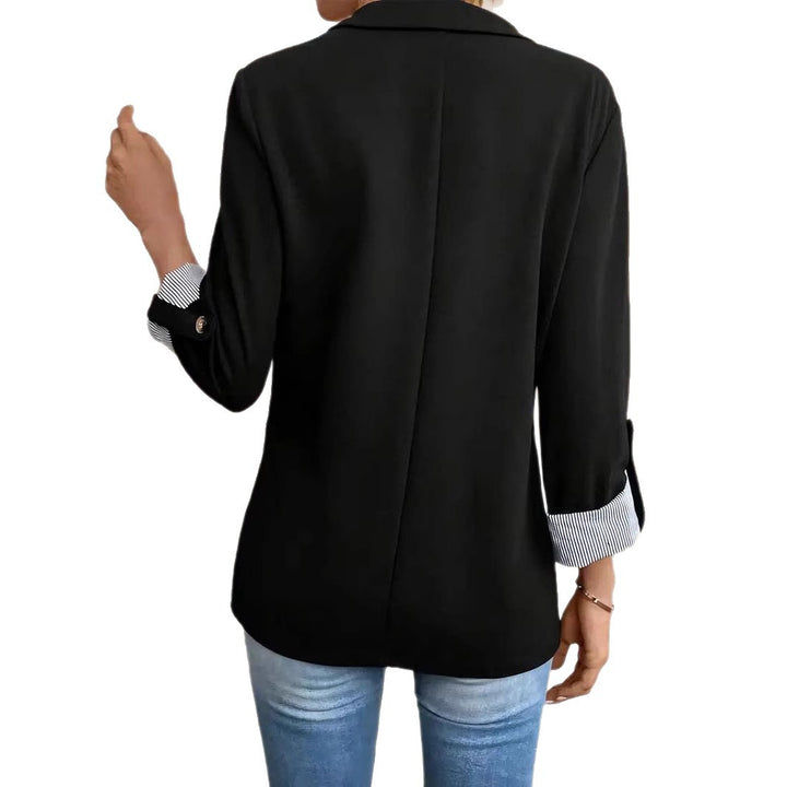 Trendy women's blazer jacket with elegant button details and striped sleeves Lune London