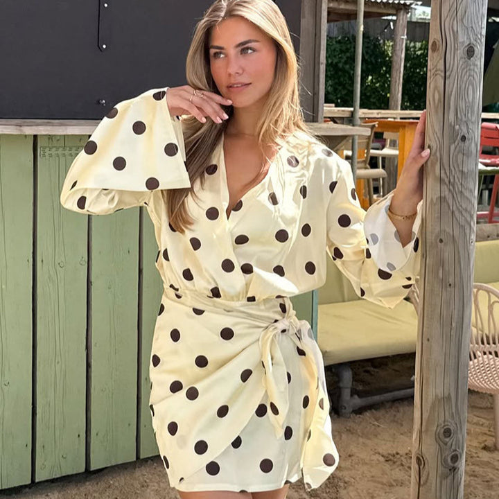 Ladies wrap mini dress with V-neck, bell sleeves and polka dot print Amarae