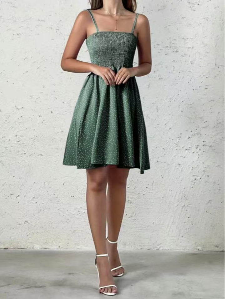 Halter neck dress for women with an airy silhouette and a lovely polka dot pattern Lune London