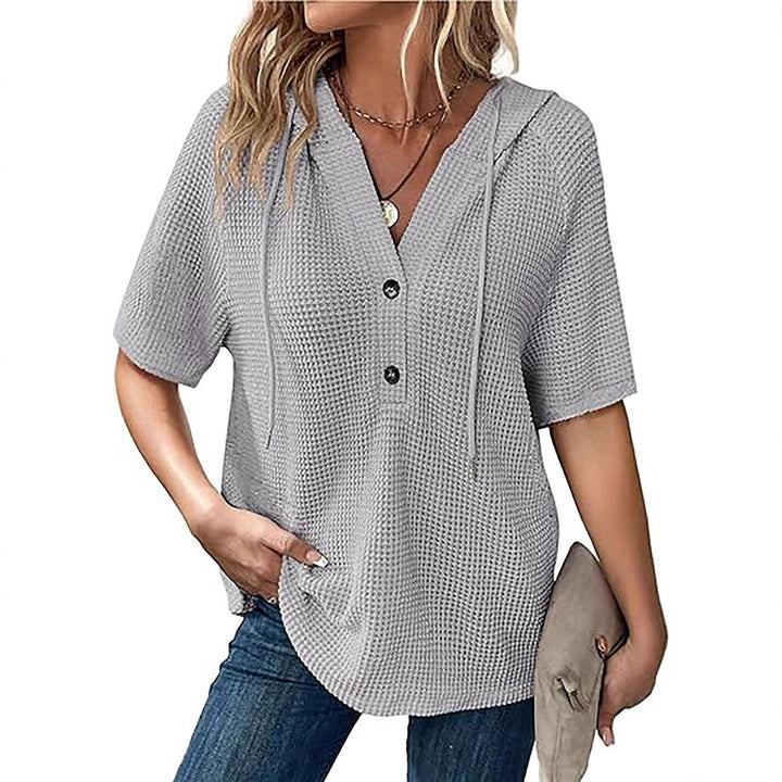 Short-sleeve blouse with embossed structure for ladies with hood and button placket Lune London