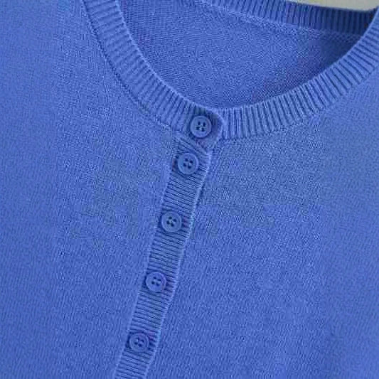 Ladies finely knitted round neck cardigan with button placket and ribbed cuffs Amarae