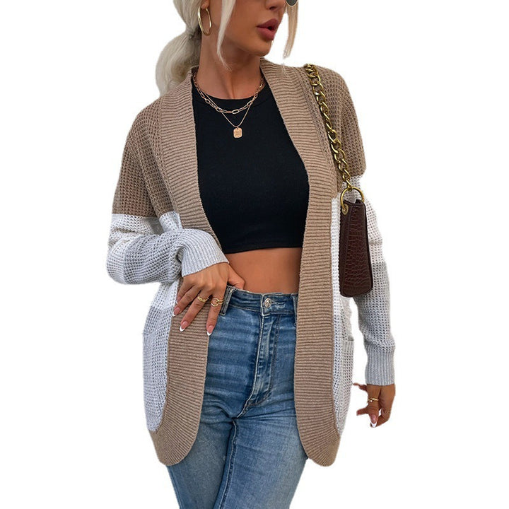 Women's knit jacket with a modern color block design and practical pockets Lune London