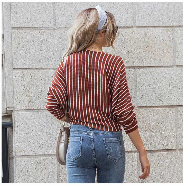 Plus size knitted sweater for women with a modern striped pattern and a casual fit Lune London