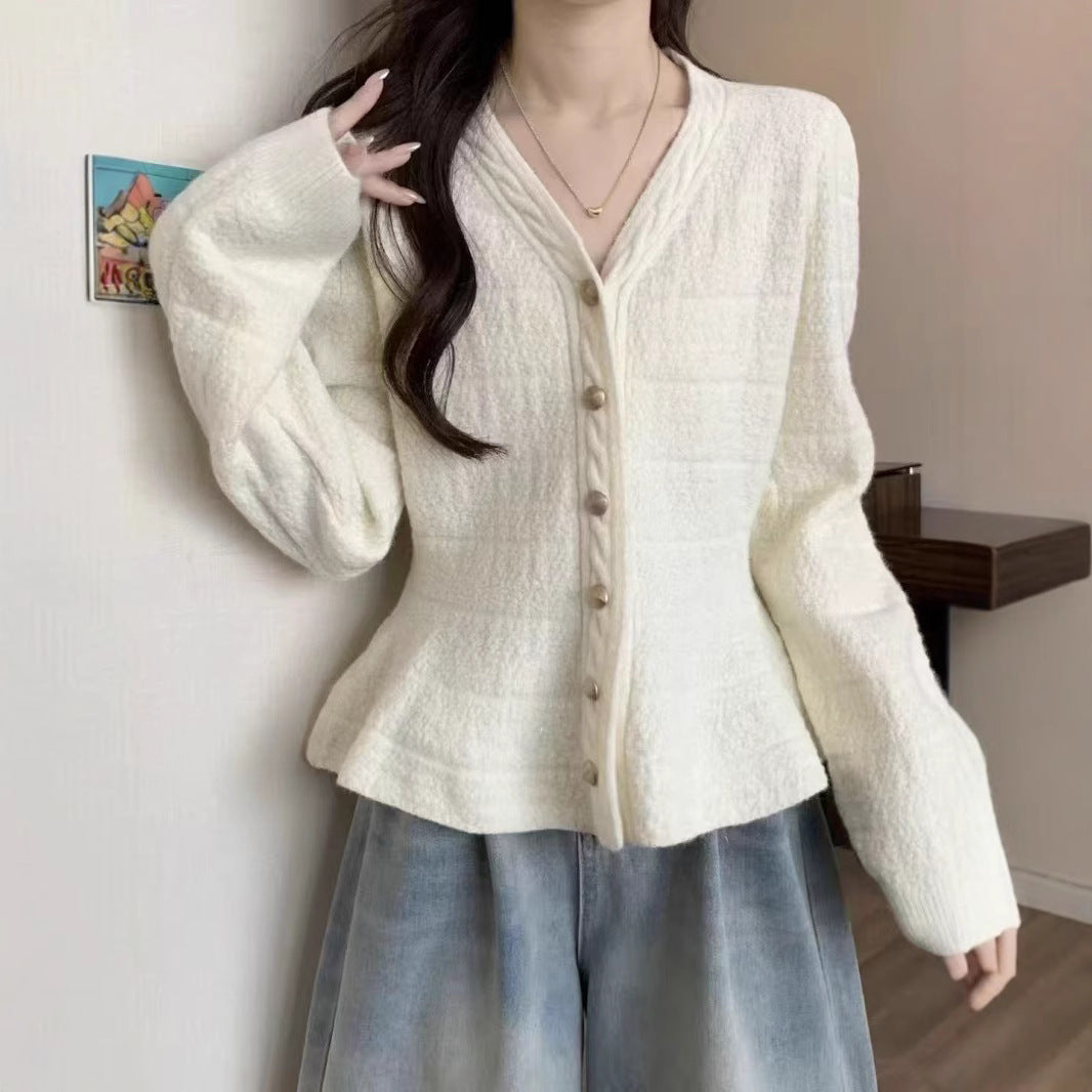 Ladies elegant cardigan with textured design and feminine puff sleeves Lune London