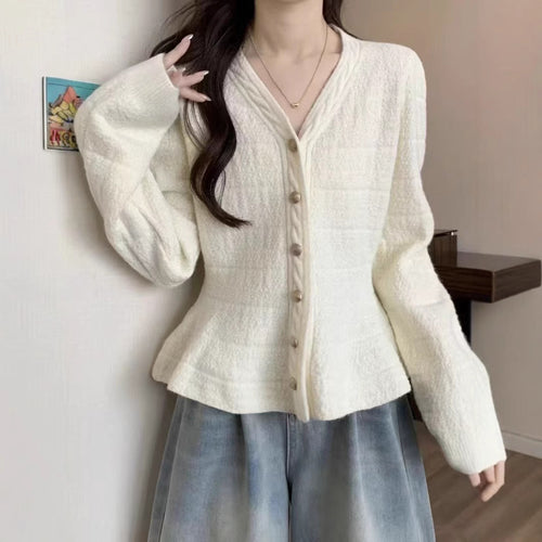 Ladies elegant cardigan with textured design and feminine puff sleeves Amarae