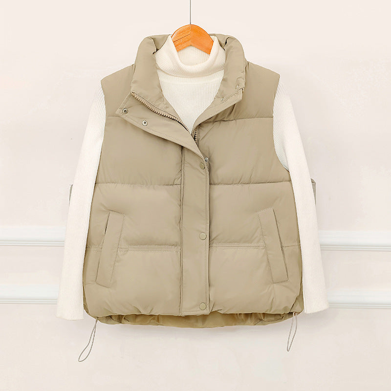 Sporty quilted vest for women with high collar and practical pockets Lune London