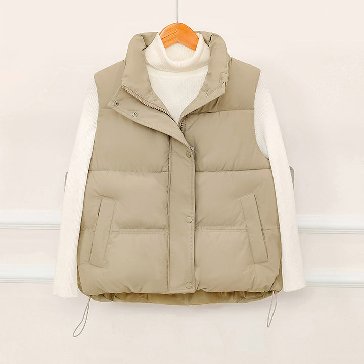 Sporty quilted vest for women with high collar and practical pockets Lune London