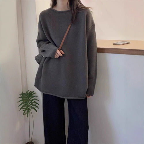 Oversized knitted sweater for women with a relaxed fit and a high collar Amarae
