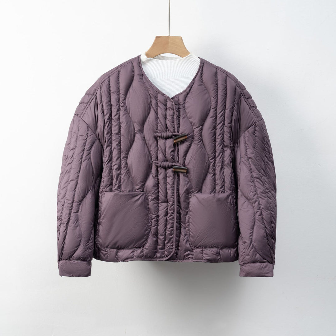 Quilted ladies' jacket with practical button closure and comfortable pockets Lune London