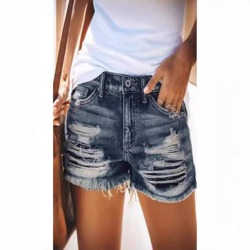 Ladies trendy destroyed denim shorts with frayed hems and fashionable ripped details Amarae