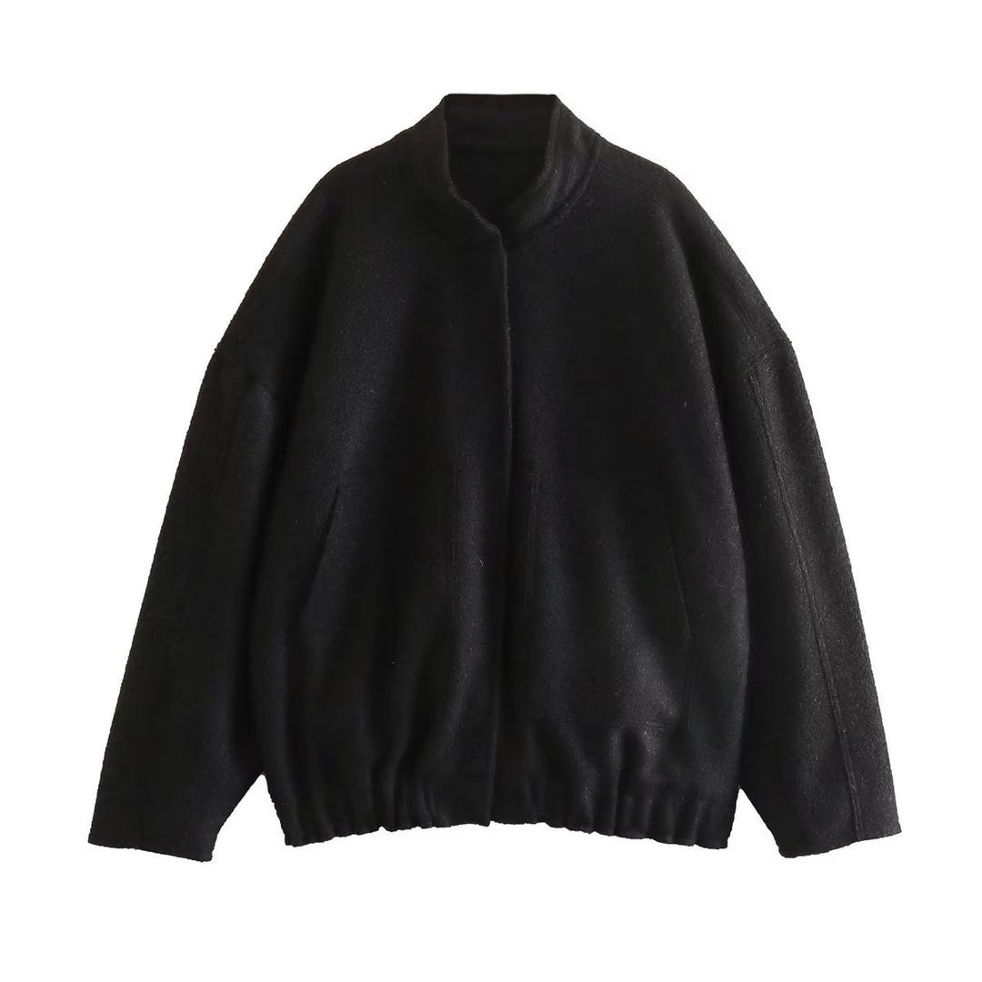 Ladies oversized fluffy coat with practical pockets and an elegant high collar Lune London