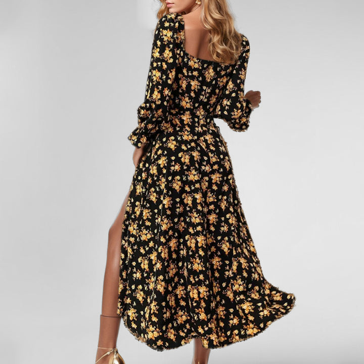 Robe midi pour femmes avec un design floral ludique et une fente haute Chic & Stil
