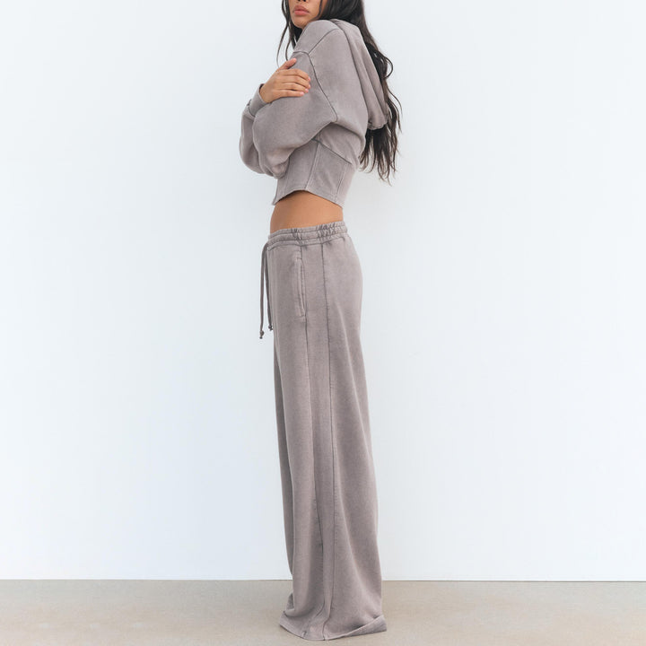 Trendy outfit for women with cropped hoodie and wide pants Lune London