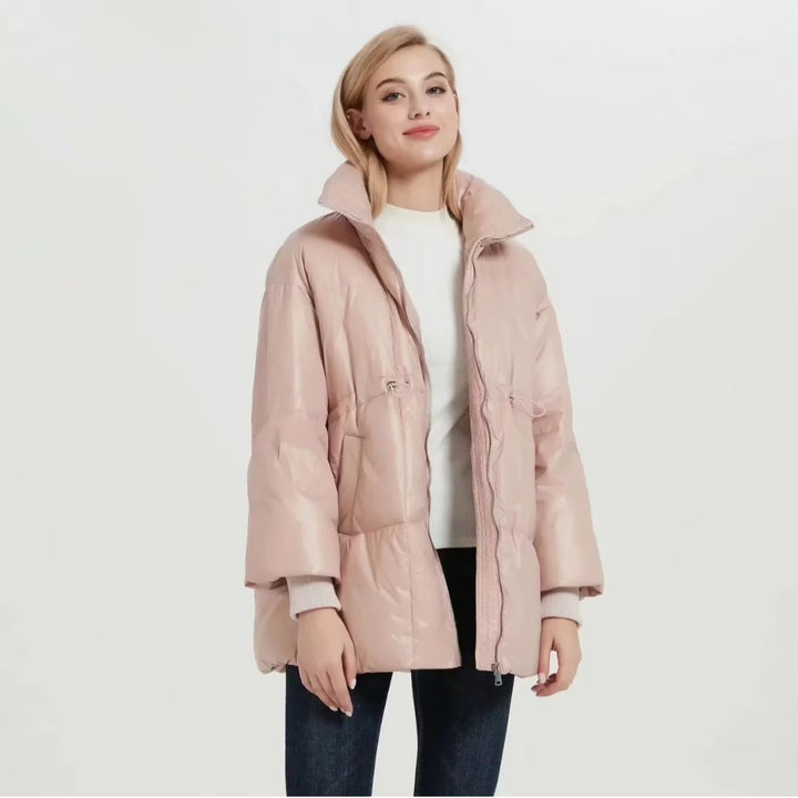 Quilted transition jacket for women with high collar and practical side pockets Lune London