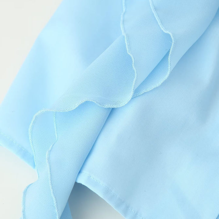 Ladies ruffle blouse with stand-up collar, ruffle details and waist belt Amarae