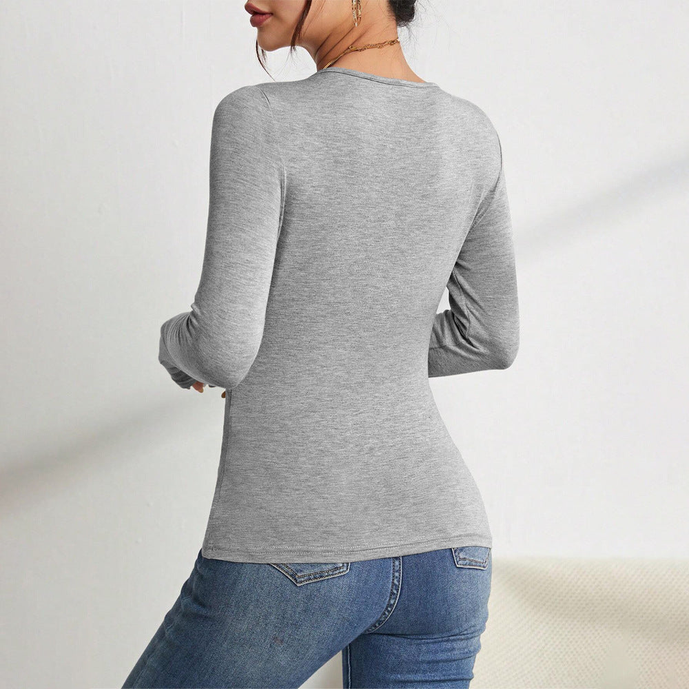 Body à manches longues pour femme avec décolleté en V tendance et détails raffinés aux épaules Chic & Stil