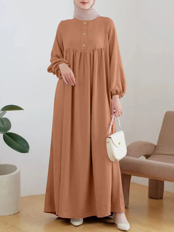 Lightweight maxi dress for women with comfortable buttoning and elegant puff sleeves Lune London