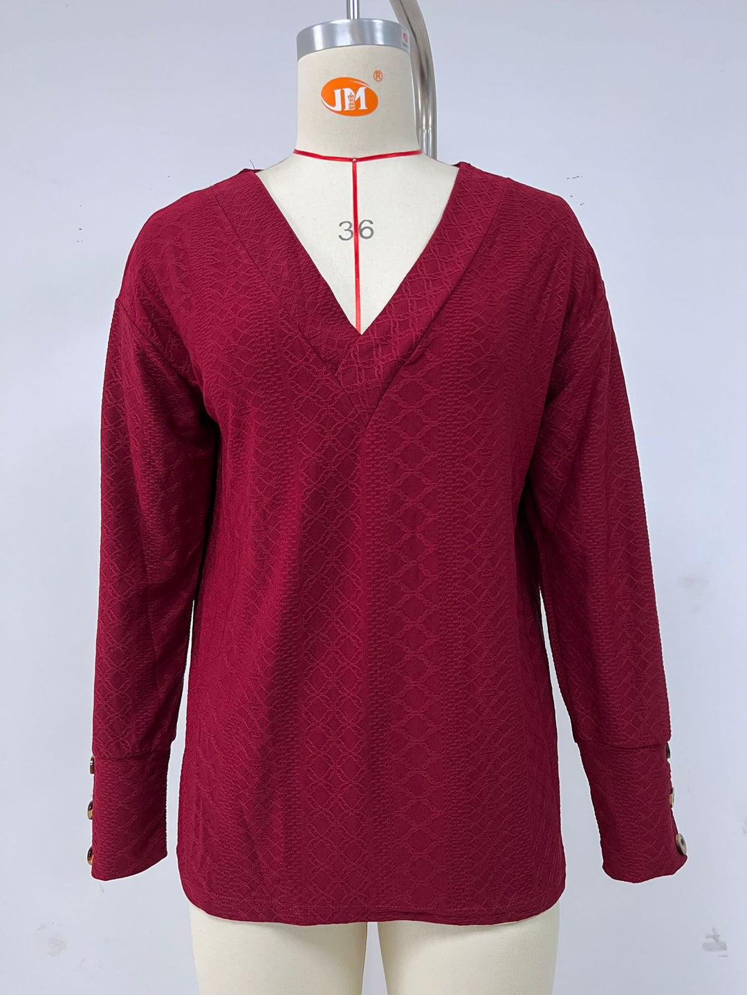 Long sleeve blouse for women with a refined V-neckline and a structured design Lune London