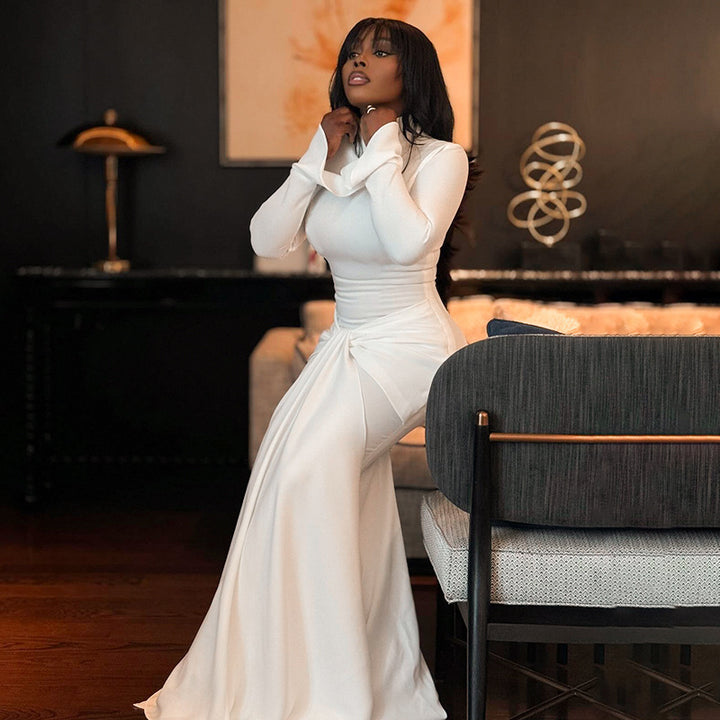 Elegant long sleeve maxi dress for women with draped hem Lune London